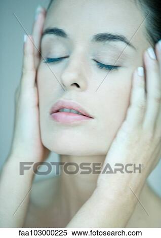 "Woman, eyes closed and hands on side of face, portrait" View Large Photo Image Stock Photography - "Woman, eyes closed and hands on side of face, portrait". Fotosearch