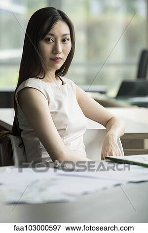 "Woman in office, portrait" View Large Photo Image Stock Photo - "Woman in office, portrait". Fotosearch