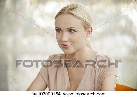 "Woman looking away, smiling, portrait" View Large Photo Image Picture - "Woman looking away, smiling, portrait". Fotosearch