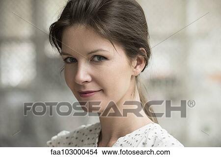 "Woman smiling, portrait" View Large Photo Image Picture - "Woman smiling, portrait". Fotosearch