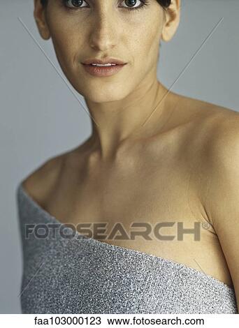 "Woman with bare shoulders looking at camera, cropped" View Large Photo Image Stock Image - "Woman with bare shoulders looking at camera, cropped". Fotosearch