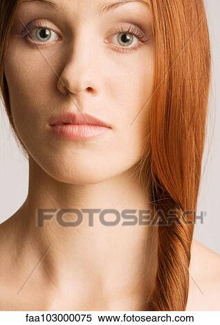 "Woman with hair to the side, portrait" View Large Photo Image Stock Photography - "Woman with hair to the side, portrait". Fotosearch