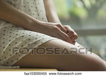 "Woman with hands clasped on lap, close-up" View Large Photo Image Stock Photography - "Woman with hands clasped on lap, close-up". Fotosearch