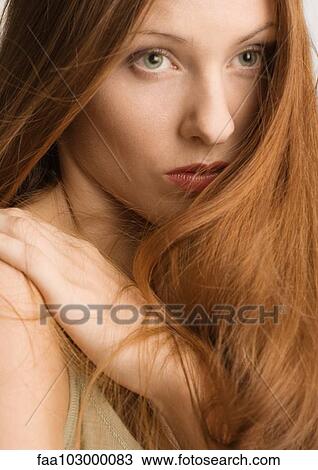 "Woman with long red hair, portrait" View Large Photo Image Stock Image - "Woman with long red hair, portrait". Fotosearch