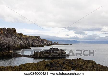 Stock Image - Coastal view, Hellnar, Iceland. Fotosearch