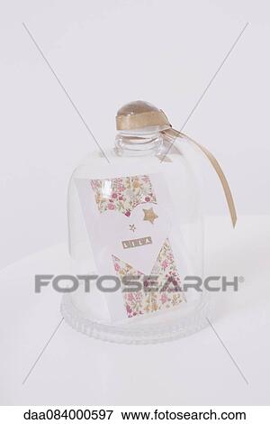 Decorative card in glass jar View Large Photo Image Stock Photo - Decorative card in glass jar. Fotosearch