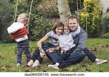 Familiy in park, portrait View Large Photo Image Stock Photography - Familiy in park, portrait. Fotosearch