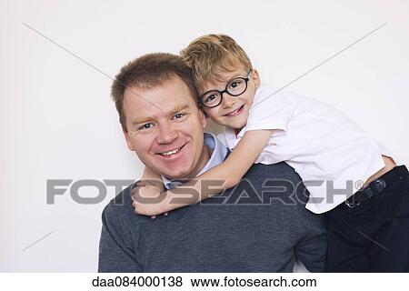 Father and son, portrait View Large Photo Image Stock Photo - Father and son, portrait. Fotosearch
