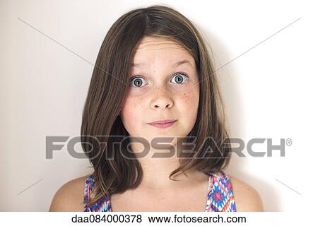 Girl with surprised expression on face, portrait View Large Photo Image Stock Photo - Girl with surprised expression on face, portrait. Fotosearch