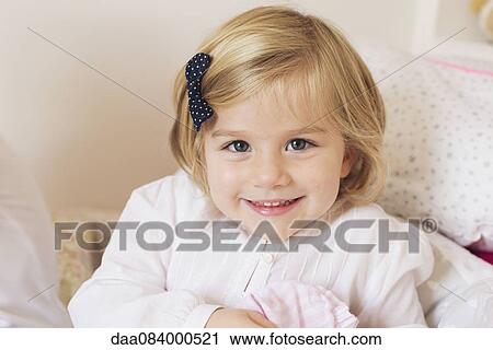 Stock Image - Little girl, portrait. Fotosearch