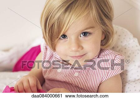 Stock Image - Little girl, portrait. Fotosearch