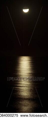 Moonlight reflected on ocean at night View Large Photo Image Stock Photography - Moonlight reflected on ocean at night. Fotosearch
