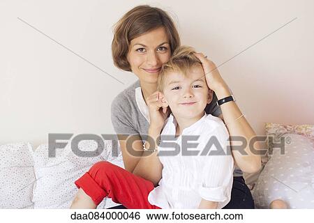 Mother and son, portrait View Large Photo Image Stock Photograph - Mother and son, portrait. Fotosearch