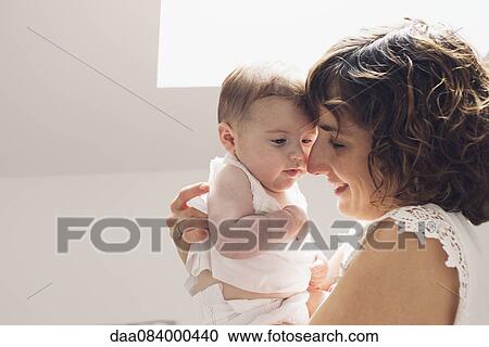 Mother with baby View Large Photo Image Stock Image - Mother with baby. Fotosearch
