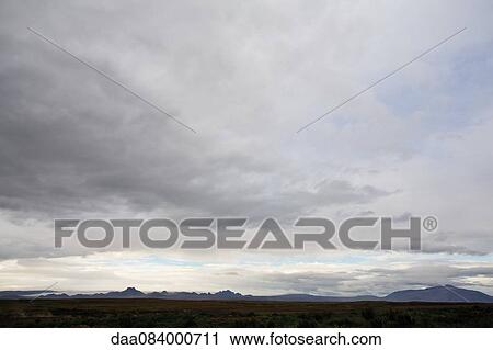 Overcast sky over flat landscape, Iceland View Large Photo Image Stock Image - Overcast sky over flat landscape, Iceland. Fotosearch