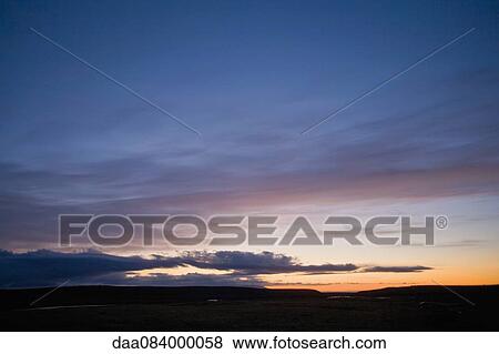 Sun setting over Nyidalur, Iceland View Large Photo Image Stock Photo - Sun setting over Nyidalur, Iceland. Fotosearch