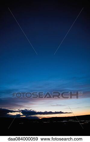 Sun setting over Nyidalur, Iceland View Large Photo Image Stock Photo - Sun setting over Nyidalur, Iceland. Fotosearch