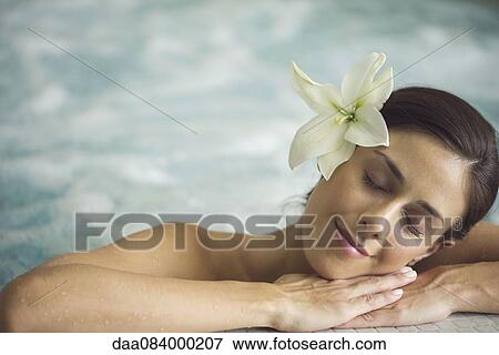 Woman in pool, resting head on arms View Large Photo Image Stock Photo - Woman in pool, resting head on arms. Fotosearch