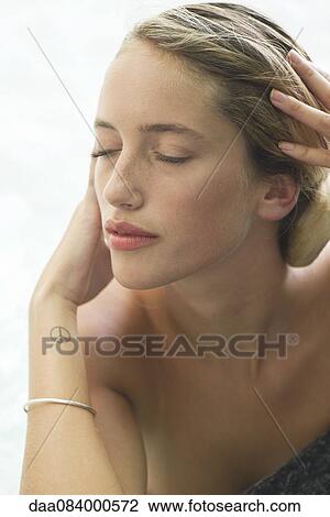 Woman relaxing in pool, portrait View Large Photo Image Stock Image - Woman relaxing in pool, portrait. Fotosearch