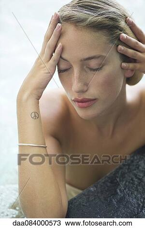 Woman relaxing in pool View Large Photo Image Stock Image - Woman relaxing in pool. Fotosearch