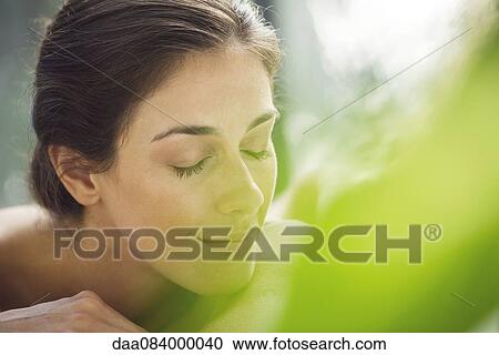 Woman resting head on arms View Large Photo Image Stock Image - Woman resting head on arms. Fotosearch