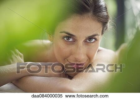 Woman resting head on arms View Large Photo Image Stock Photography - Woman resting head on arms. Fotosearch
