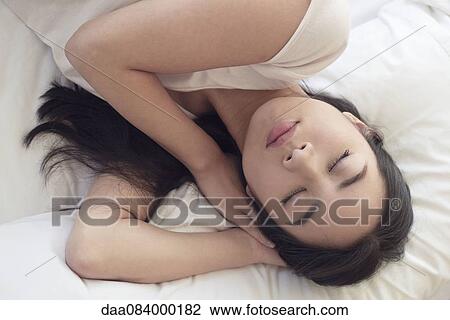 Woman sleeping View Large Photo Image Stock Image - Woman sleeping. Fotosearch