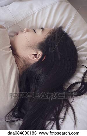 Woman sleeping View Large Photo Image Stock Image - Woman sleeping. Fotosearch