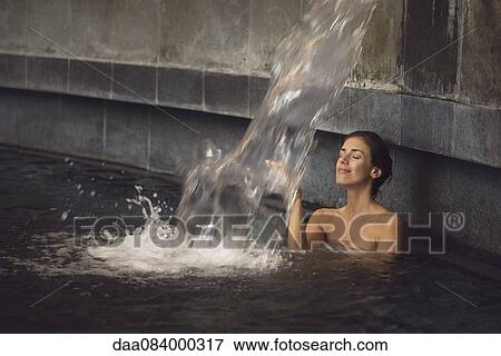Woman soaking in spa pool View Large Photo Image Stock Photo - Woman soaking in spa pool. Fotosearch
