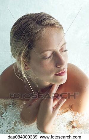 Woman soaking in spa pool View Large Photo Image Stock Photo - Woman soaking in spa pool. Fotosearch