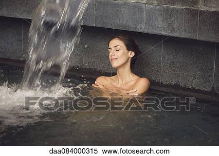 Woman soaking in spa pool View Large Photo Image Stock Photography - Woman soaking in spa pool. Fotosearch