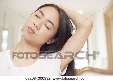 Woman stretching View Large Photo Image Stock Image - Woman stretching. Fotosearch