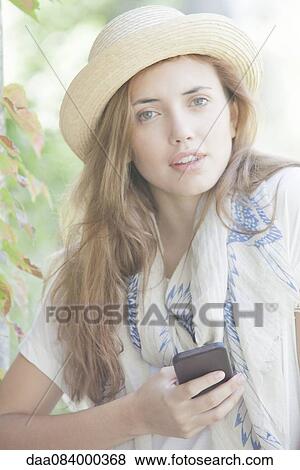 Stock Photo - Young woman, portrait. Fotosearch