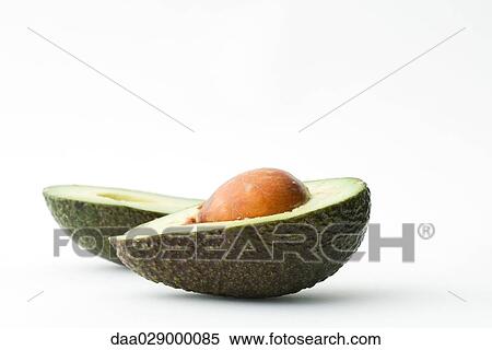 Avocado halves View Large Photo Image Stock Photography - Avocado halves. Fotosearch