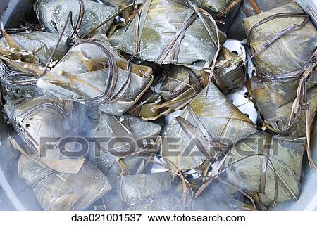 Banana leaf appetizers being steamed, close-up View Large Photo Image Stock Photo - Banana leaf appetizers being steamed, close-up. Fotosearch