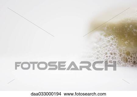 Bar of soap and suds, close-up View Large Photo Image Picture - Bar of soap and suds, close-up. Fotosearch