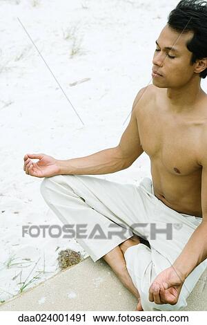Barechested man sitting in lotus position, eyes closed, cropped View Large Photo Image Stock Image - Barechested man sitting in lotus position, eyes closed, cropped. Fotosearch