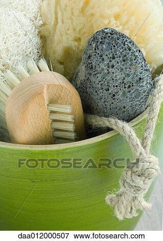 Bowl containing bath sponges, brush and pumice stone View Large Photo Image Stock Photo - Bowl containing bath sponges, brush and pumice stone. Fotosearch