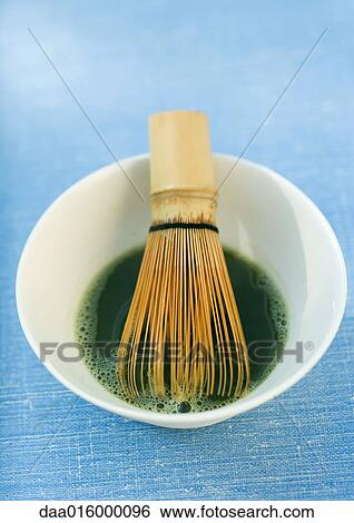 Bowl of macha tea and tea whisk View Large Photo Image Stock Photograph - Bowl of macha tea and tea whisk. Fotosearch