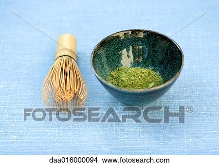 Bowl of macha tea powder and tea whisk View Large Photo Image Picture - Bowl of macha tea powder and tea whisk. Fotosearch