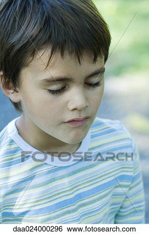 Boy, eyes closed, head and shoulders View Large Photo Image Stock Photograph - Boy, eyes closed, head and shoulders. Fotosearch