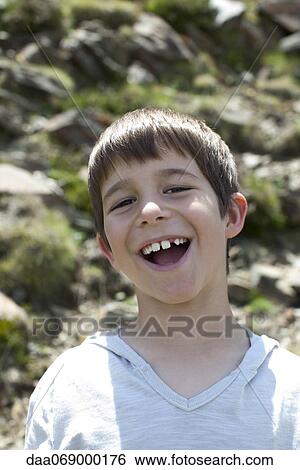 Boy laughing, portrait View Large Photo Image Stock Photograph - Boy laughing, portrait. Fotosearch