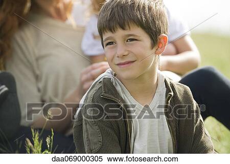 Boy looking away in thought View Large Photo Image Stock Photography - Boy looking away in thought. Fotosearch