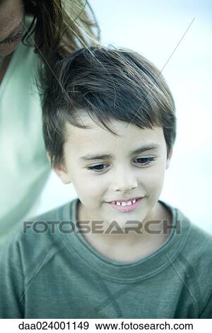 Boy with mother, cropped, portrait View Large Photo Image Stock Photo - Boy with mother, cropped, portrait. Fotosearch