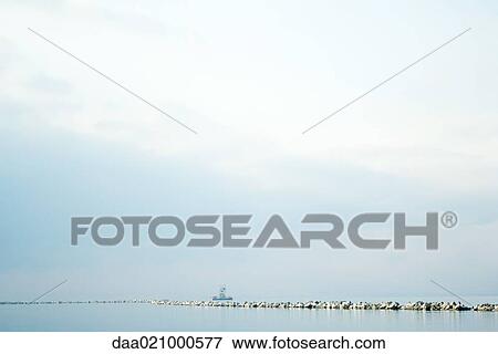 Breakwater on lake View Large Photo Image Stock Photo - Breakwater on lake. Fotosearch