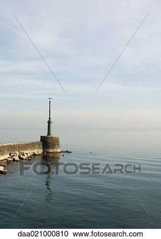 Breakwater with beacon View Large Photo Image Stock Image - Breakwater with beacon. Fotosearch
