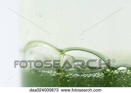 Bubbles in green gel, extreme close-up View Large Photo Image Stock Image - Bubbles in green gel, extreme close-up. Fotosearch