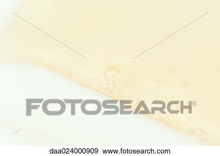 Bubbles in running liquid, extreme close-up View Large Photo Image Stock Photo - Bubbles in running liquid, extreme close-up. Fotosearch