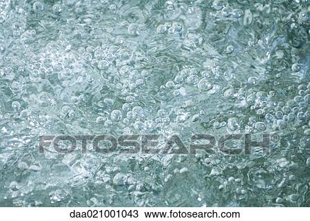 Bubbles in water, full frame, close-up View Large Photo Image Stock Image - Bubbles in water, full frame, close-up. Fotosearch