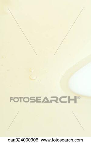 Bubbles in yellow liquid, extreme close-up View Large Photo Image Stock Photograph - Bubbles in yellow liquid, extreme close-up. Fotosearch